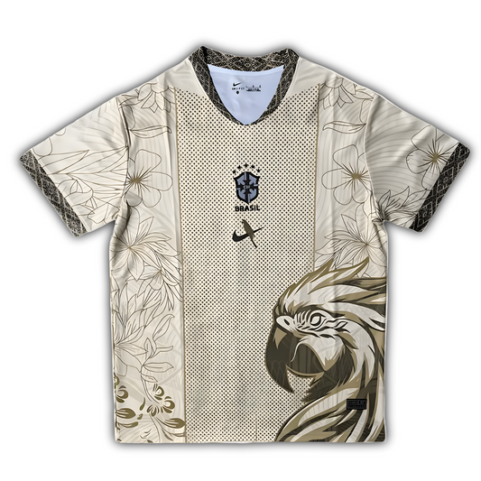 Brazil 2025/26 cream arara parrot concept football shirt front view with gold parrot motif and floral detailing