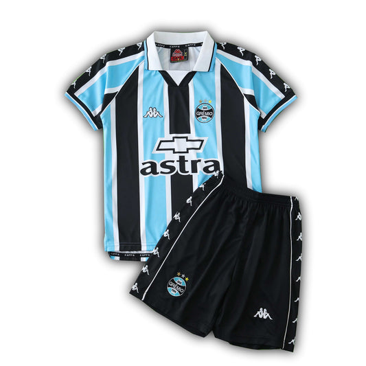 Grêmio FBPA 2000 kids home football kit with blue, black, and white striped jersey and matching shorts