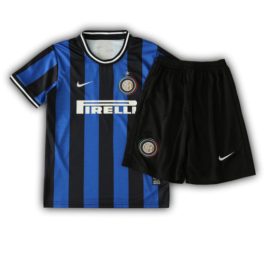 Inter Milan 2009/10 children’s home football kit with blue and black striped jersey and black shorts – Pirelli sponsor