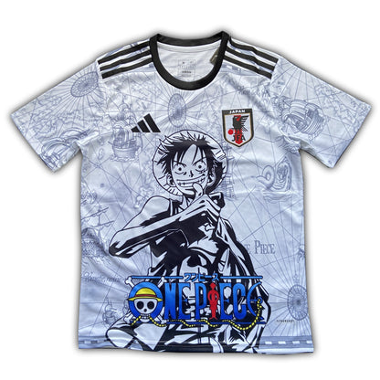 Japan special edition football jersey featuring One Piece anime design with Luffy graphic and Japan FA crest